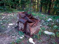 Photo of what appears to be an old rusty wood stove